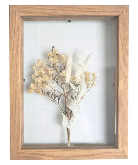 Kunstbloemen in een fotolijst
