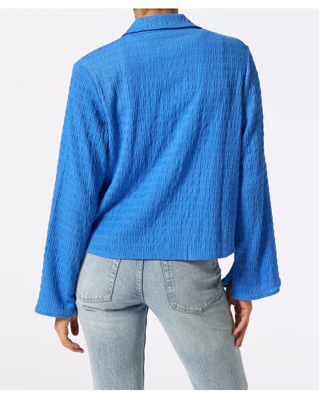 بلوزة بقماش مجعد وأكمام واسعة للنساء، أزرق (KiK Crinkle-Bluse mit Trompetenärmeln (blau)) — KiK, منتج ألماني أصلي في المغرب