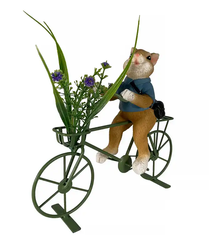 Deko-Hase auf Fahrrad Ostern