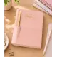 Cuaderno con bolígrafo