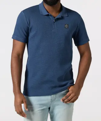 Poloshirt mit Aufnäher