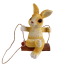 Gartenfigur Hase auf Schaukel braun