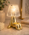 LED-Leuchte mit Figur gold glänzend