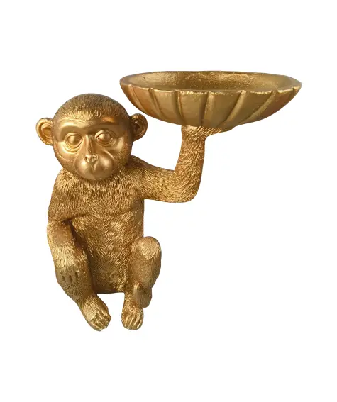 Deko-Affe mit Schale in der Hand