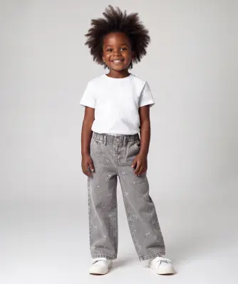 Jeans mit Schleifenstickereien
