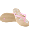 Slippers in raffiagelook pink