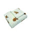 Kuscheldecke mit Hochlandrindern creme