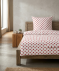 Polycotton-Bettwäsche in Komfortgröße rot bedruckt