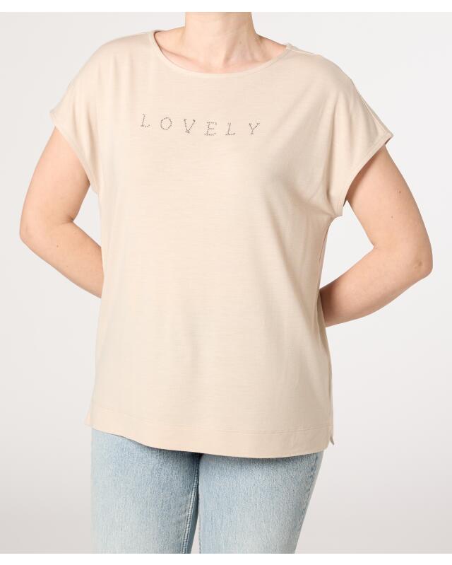 تيشيرت بكتابة من حجر الراين للنساء، كريمي (KiK Shirt mit Schriftzug aus Steinchen (creme)) — KiK, منتج ألماني أصلي في المغرب